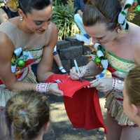 <p>Autographing a Christmas Spectacular shirt.</p>