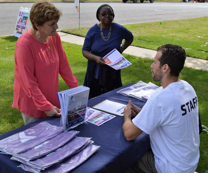 James Chiappone of the Meadowlands YMCA answers question for potential members outside the Y&#x27;s program center in East Rutherford.