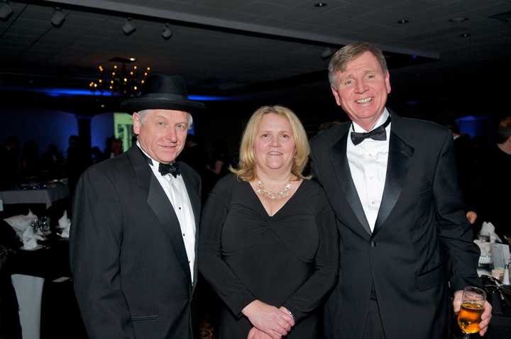 Historical Society Chairman Geoffrey Herald (left) with Denise Wiedl and Danbury Fire Chief TJ Wiedl at Friday night&#x27;s Hat City Ball.