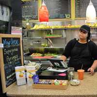 <p>Jocelyn working the counter at Super Juice Nation in Ridgewood.</p>