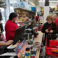 <p>Customers shop in the newly reopened William Tell True Value Hardware store in Hopewell.</p>