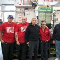 <p>Employees and customers celebrate the reopening of William Tell True Value Hardware in Hopewell Junction.</p>