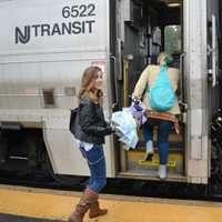 <p>A relaxed Francina Alvarez boards a train for a night pleasure trip into New York City in contrast to her more frazzled morning commute.</p>