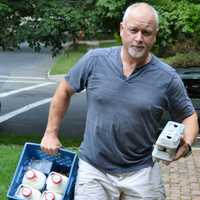 <p>Christian Singleton, warehouse manager for Organic Milk Corp, making a delivery.</p>