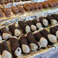 <p>Chocolate and assorted cannolis.</p>