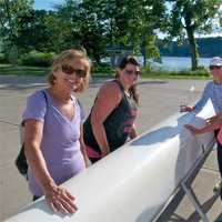 <p>Members of a novice sweep rowing class get ready to hit the Hudson River.</p>