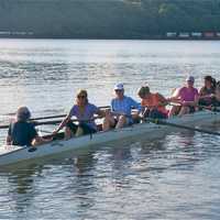 <p>Rowers take off on a eight-man scull, with coxswain.</p>