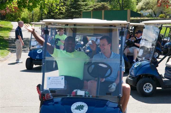 Golfers enjoy the great weather as they head out for the Regional YMCA of Western Connecticut 27th annual Golf Classic recently at the Richter Park Golf Course in Danbury.