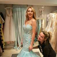 <p>Laura&#x27;s Boutique owner Laura Rudovic gets a young girl ready for her big event with hair, makeup, and a glamorous gown.</p>