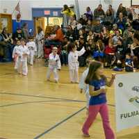 <p>Teams march into the gym in an Olympic style procession at Friday night&#x27;s Board Break-A-Thon.</p>