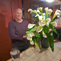 <p>Michael Both (L) and William Fitzgerald work on an arrangement in their Mahopac shop.</p>