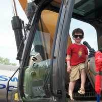 <p>Kids check out emergency vehicles, motorcycles and the big rigs at Saturday&#x27;s Barnum Festival Touch-A-Truck event in Fairfield.</p>