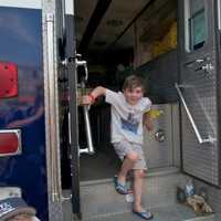 <p>Kids get a chance to check out emergency vehicles, motorcycles and the big rigs at Saturday&#x27;s Barnum Festival Touch-A-Truck event.</p>