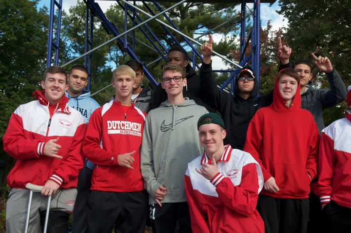 Tappan Zee fans cheer on the Dutchmen during the opening round Class A playoff game.