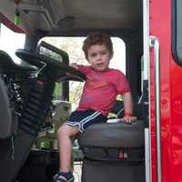 <p>Kids climb on the emergency vehicles, motorcycles and the big rigs at Saturday&#x27;s Barnum Festival Touch-A-Truck event.</p>