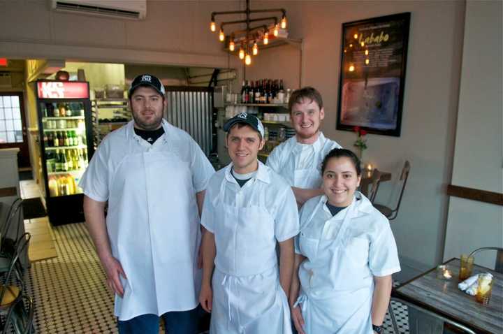 Chef/owner Brian Arnoff with some of the staff from Kitchen Sink Food &amp; Drink.