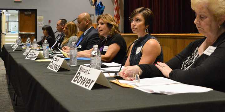 School board candidates answering questions.