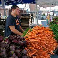 <p>Local produce and lots of other goods brought nice crowds out to the Down To Earth Farmers Market in Ossining Saturday, despite temperatures in the mid-90s and high humidity.</p>