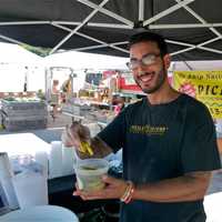 <p>Local produce and lots of other goods brought nice crowds out to the Down To Earth Farmers Market in Ossining Saturday, despite temperatures in the mid-90s and high humidity.</p>