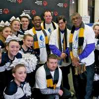 <p>Cheerleaders from John Jay High School came out to support the athletes, posing here with some of the Hudson Valley team members.</p>