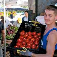 <p>Local produce and lots of other goods brought nice crowds out to the Down To Earth Farmers Market in Ossining Saturday, despite temperatures in the mid-90s and high humidity.</p>