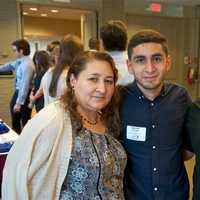 <p>Port Chester High&#x27;s Steven Hernandez, a Steer graduate and honoree, with parents Maria and Adan.</p>