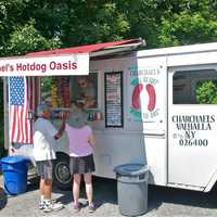 <p>Owners Sal and Tina Celona have run the Charchael&#x27;s truck for 25 years, and their specialty is hot dogs and their own home style chili and onions.</p>