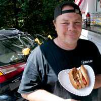 <p>A happy regular at Charchael&#x27;s Hotdog Oasis.</p>