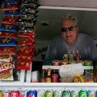 <p>Owner Sal Celona pauses for a photo during a recent lunch hour.</p>