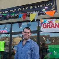 <p>Owner Theodore Lampropoulos in front of the new Mahopac Wine &amp; Liquor store.</p>