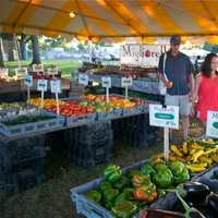 <p>This farmer&#x27;s market greets visitors at one of the fair&#x27;s main entrances.</p>