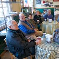 <p>The &quot;Three-o-Clockers&quot; enjoy their afternoon coffee at the Goodie Shoppe.</p>