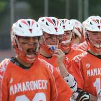 <p>Mamaroneck players watch from the sidelines.</p>