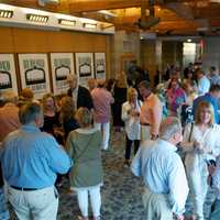 <p>Attendees mingle during the fundraiser for the Bedford Playhouse Friday night.</p>