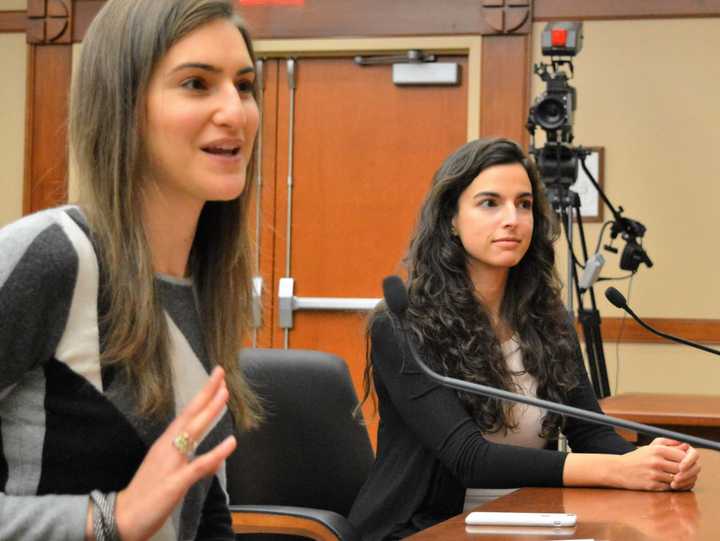 Uber executives Lily Sassoon, left, and Ana Mahony present their subsidized rides plan to the Ridgewood Council.