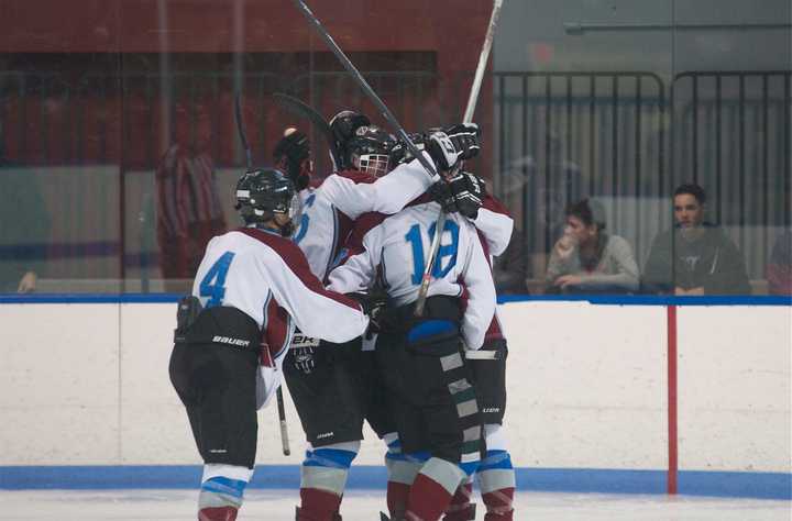 Rye Town/Harrison celebrated a playoff win over Pearl River on Sunday.