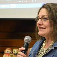 <p>Closter Mom Lisa Oliveri Vreeland, founder of Robby&#x27;s Rabits, addresses sixth-graders at the Holdrum Middle School in River Vale.</p>