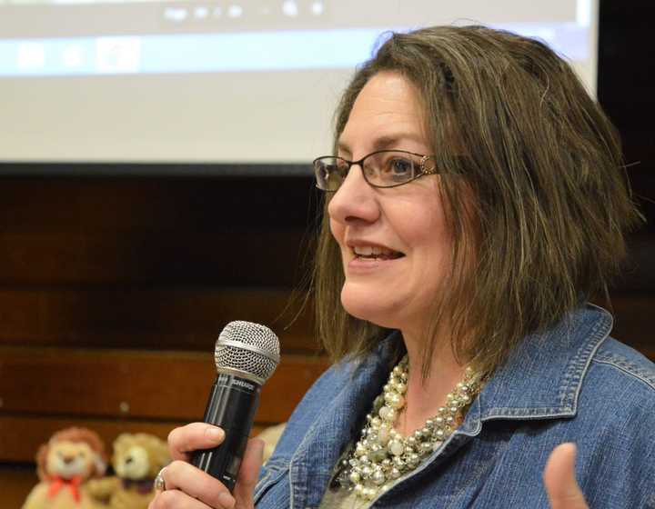 Closter Mom Lisa Oliveri Vreeland, founder of Robby&#x27;s Rabits, addresses sixth-graders at the Holdrum Middle School in River Vale.