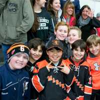 <p>Young fans enjoy the action Sunday at Brewster.</p>