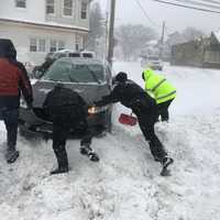 To The Rescue: Stratford Cops Dig Stranded Driver Out Of Snow