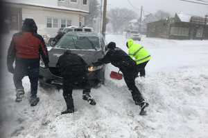 To The Rescue: Stratford Cops Dig Stranded Driver Out Of Snow