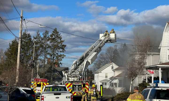 Firefighters on the scene of a fire on Sitnick Avenue in Chicopee