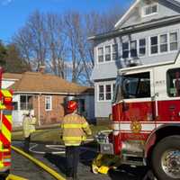 <p>Firefighters respond to a fire on Stinik Avenue in Chicopee Tuesday, Jan. 31</p>