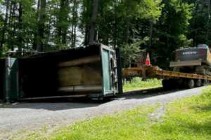 Massachusetts EMS Crews Rescue Fellow Firefighter Pinned Under Dump Truck