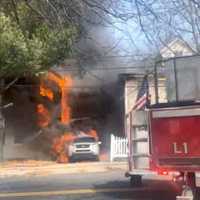 <p>Upon arrival, Lynn firefighters saw two cars fully engulfed in flames</p>