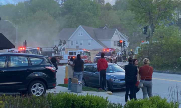 Crews on the scene of a multi-alarm fire on Pleasant Street in Worcester on Monday, May 1