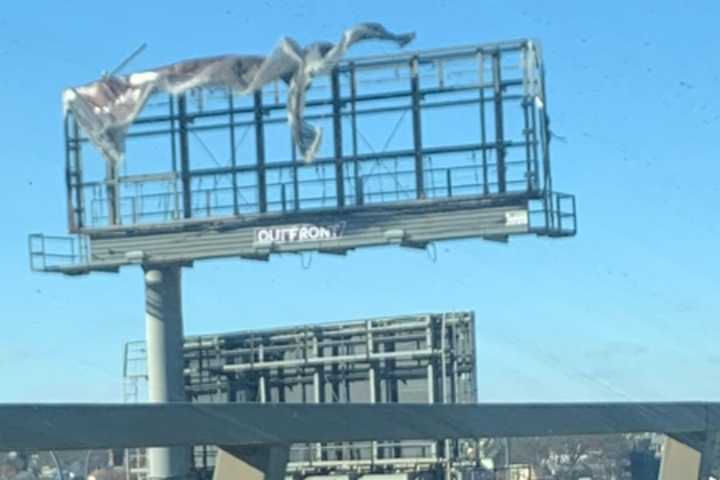 Gone With The Wind: Boston-Area Billboard Gets Shredded By Frigid Gusts