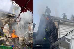 Off-Duty Boston Firefighter Catches Baby As Crews Battle 2-Alarm House Fire