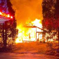 Sleeping Resident Escapes Multi-Alarm Fire At South Shore Home: Fire Officials