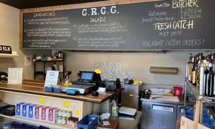 The front counter at Crane River Cheese Club in Beacon Hill